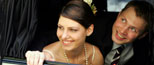 smiling in wedding limo